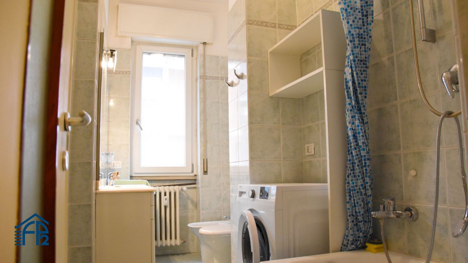 Trilocale con cucina abitabile